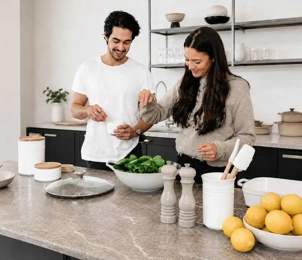 boyfriend and girlfriend cooking a healthy meal in the kitchen together
