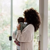 women postnatal with baby