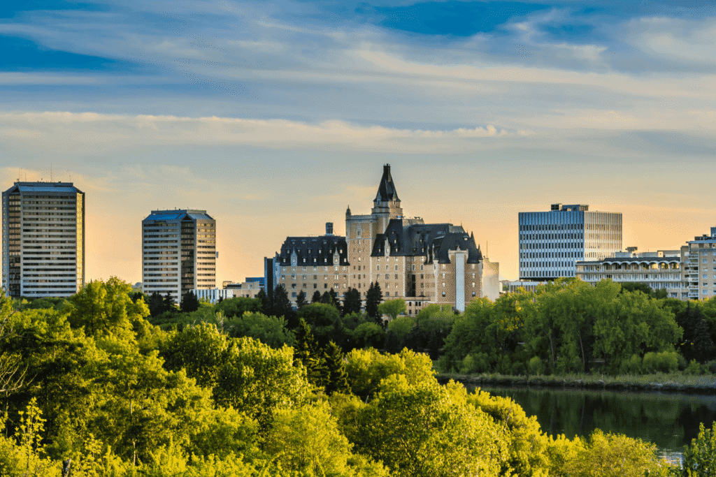 Saskatoon's rocky riverside skyline in soft sunlight, representing In Good Nutrition's commitment to empowering Saskatonians with personalized dietitian support.